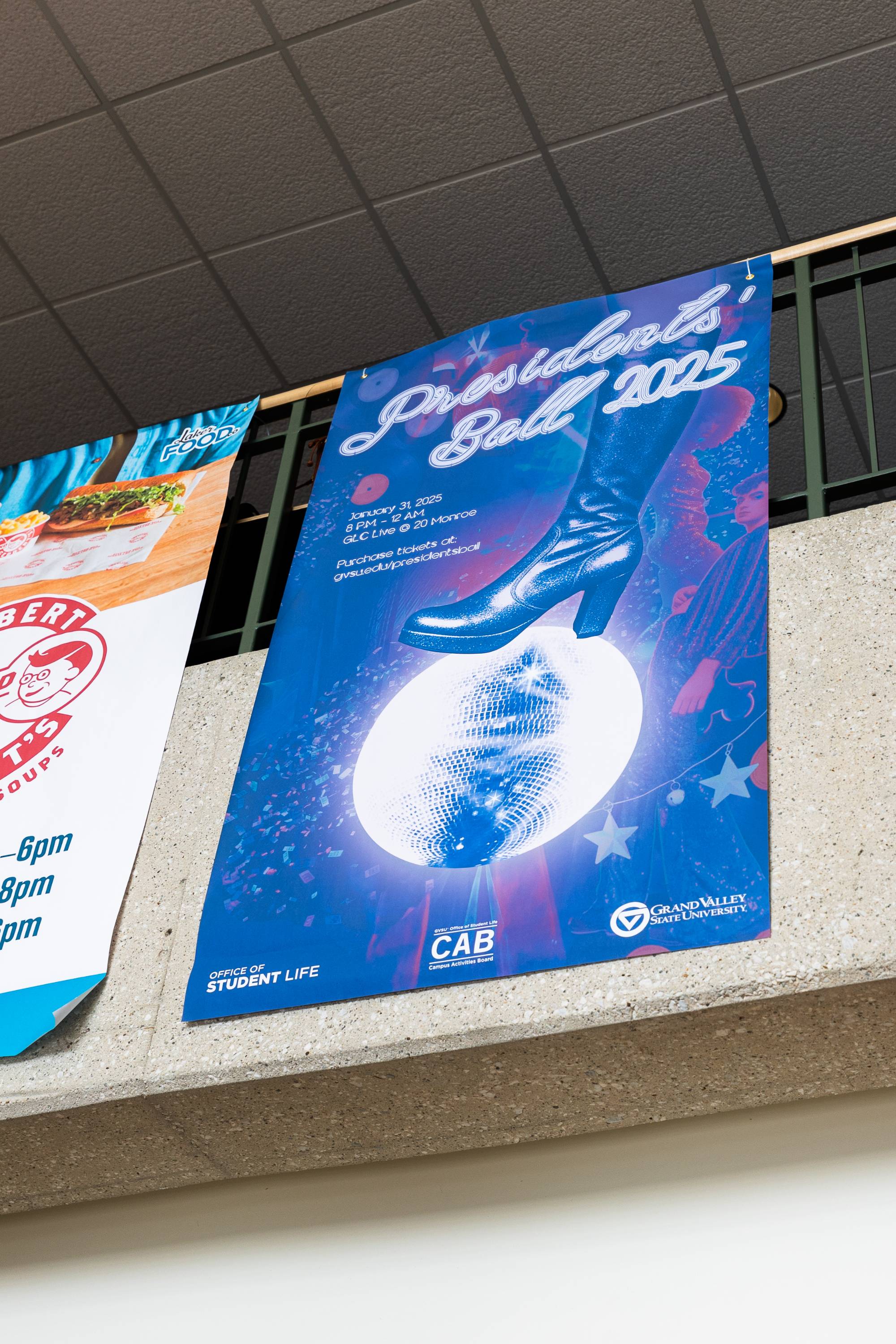 Banner hanging in Kirkhof promoting Presidents' Ball